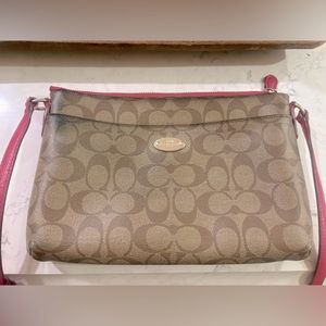 Coach crossbody. Used. Some wear spots from use.
